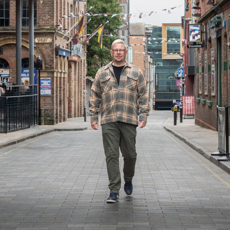 Scott walking through Liverpool